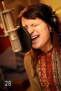 Evy Zee laying down some vocals